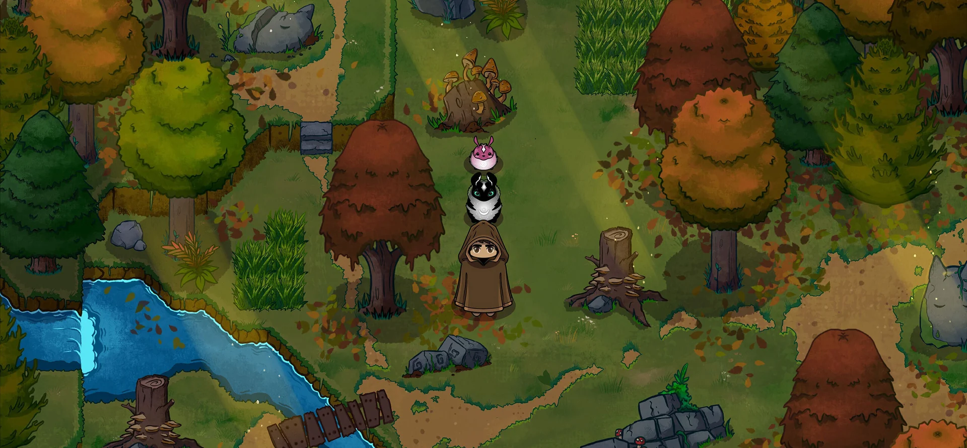 Top-down view of the Chumbi Valley forest world with a trainer and Chumbi